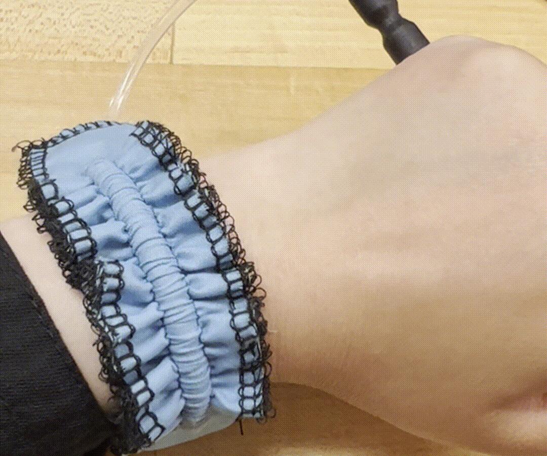 Soft Robotic Wearable Actuator: Fluidic Fabric Muscle Sheets