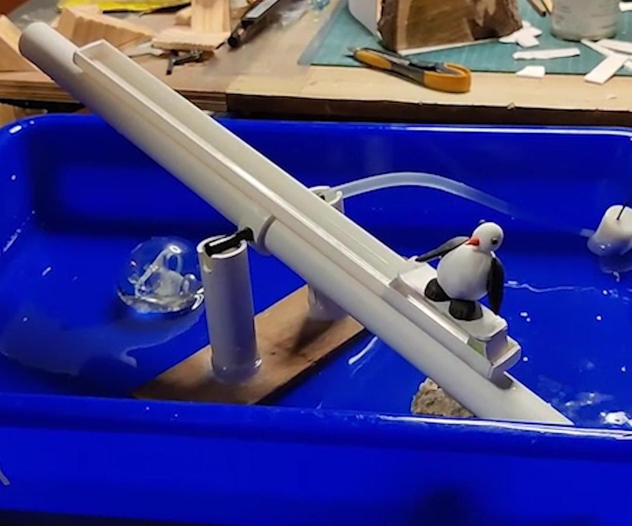 A Seesaw for All Seasons: a DIY Water-Powered Seesaw With a Sliding Penguin