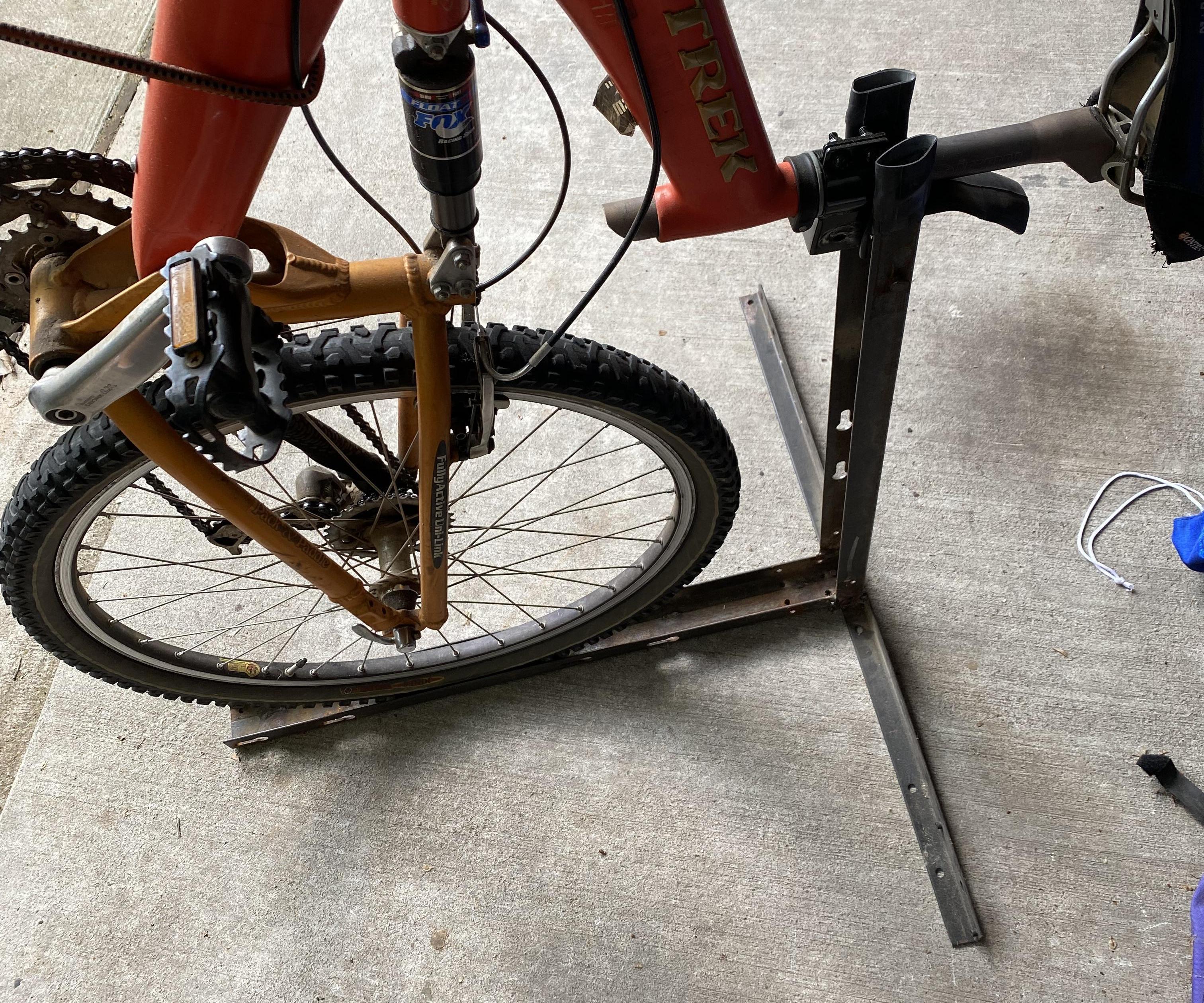 Compact Upright Bicycle Stand Made From Bed Frame Rails
