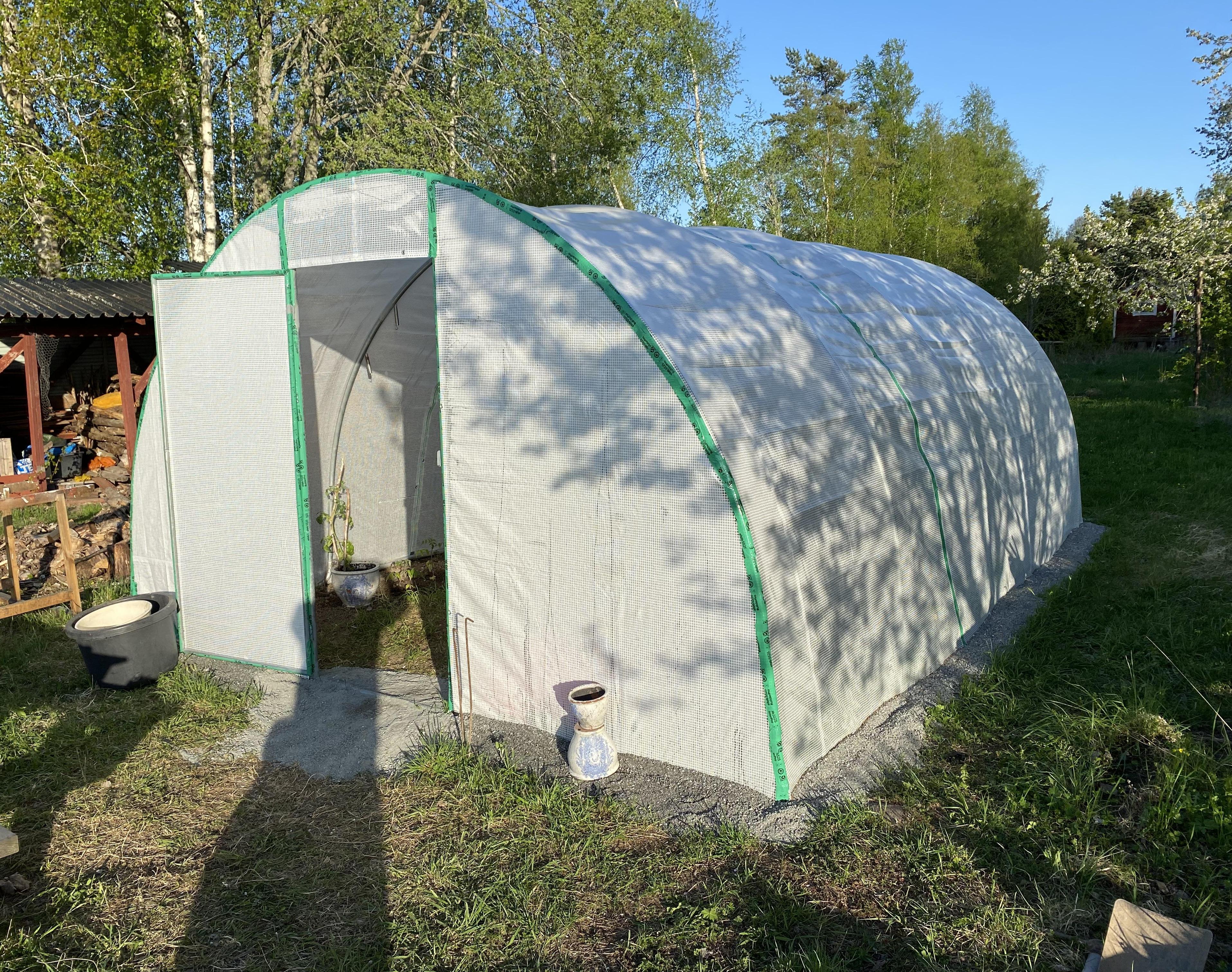 Make a Tunnel Greenhouse From Old Trampolines
