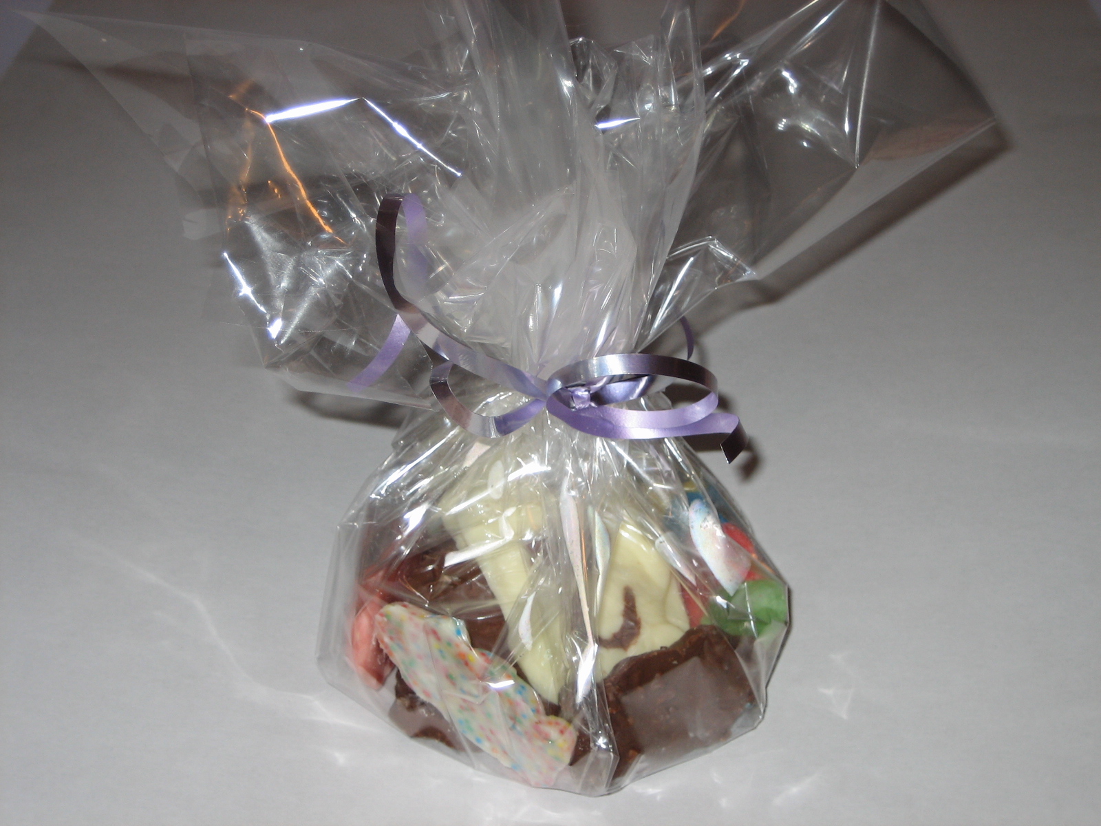 Custom made; shaped, flavoured and coloured chocolates.