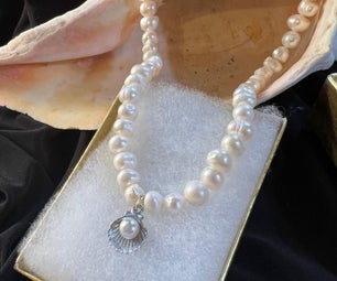 Pearl Necklace With Oyster Shell Charm