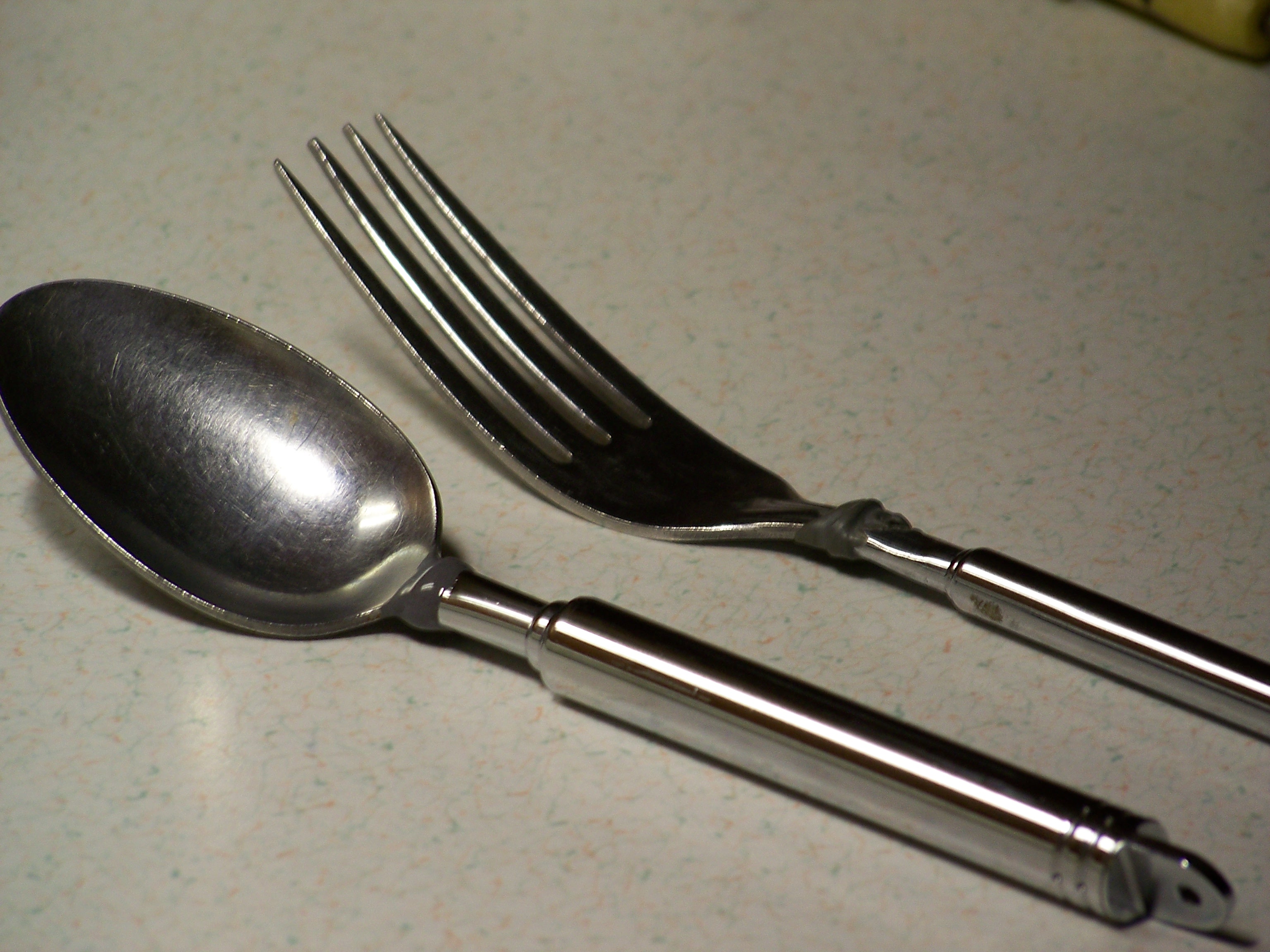 Pocket sized collapsible eating utensils. 