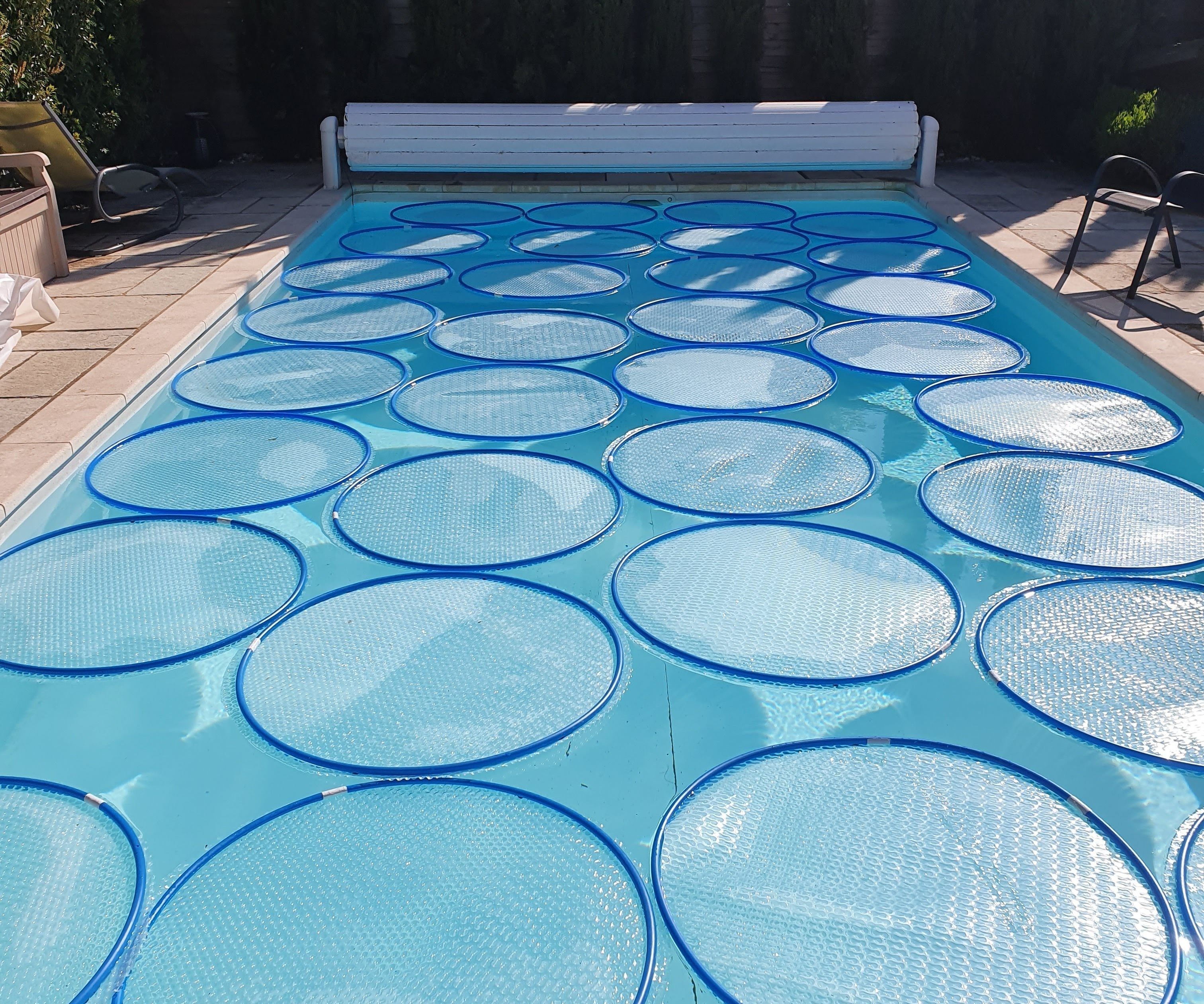 Heat Your Pool With Solar Lily Pads