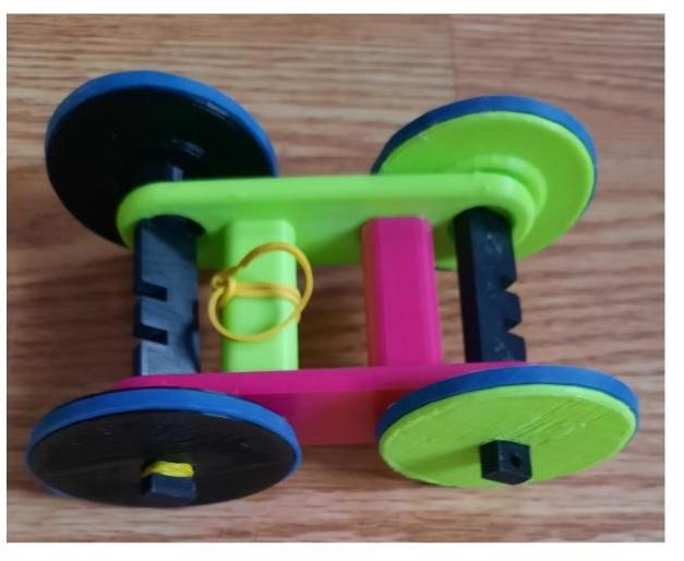 Teaching Engineering Design Using 3D Printed Rubber Band Cars